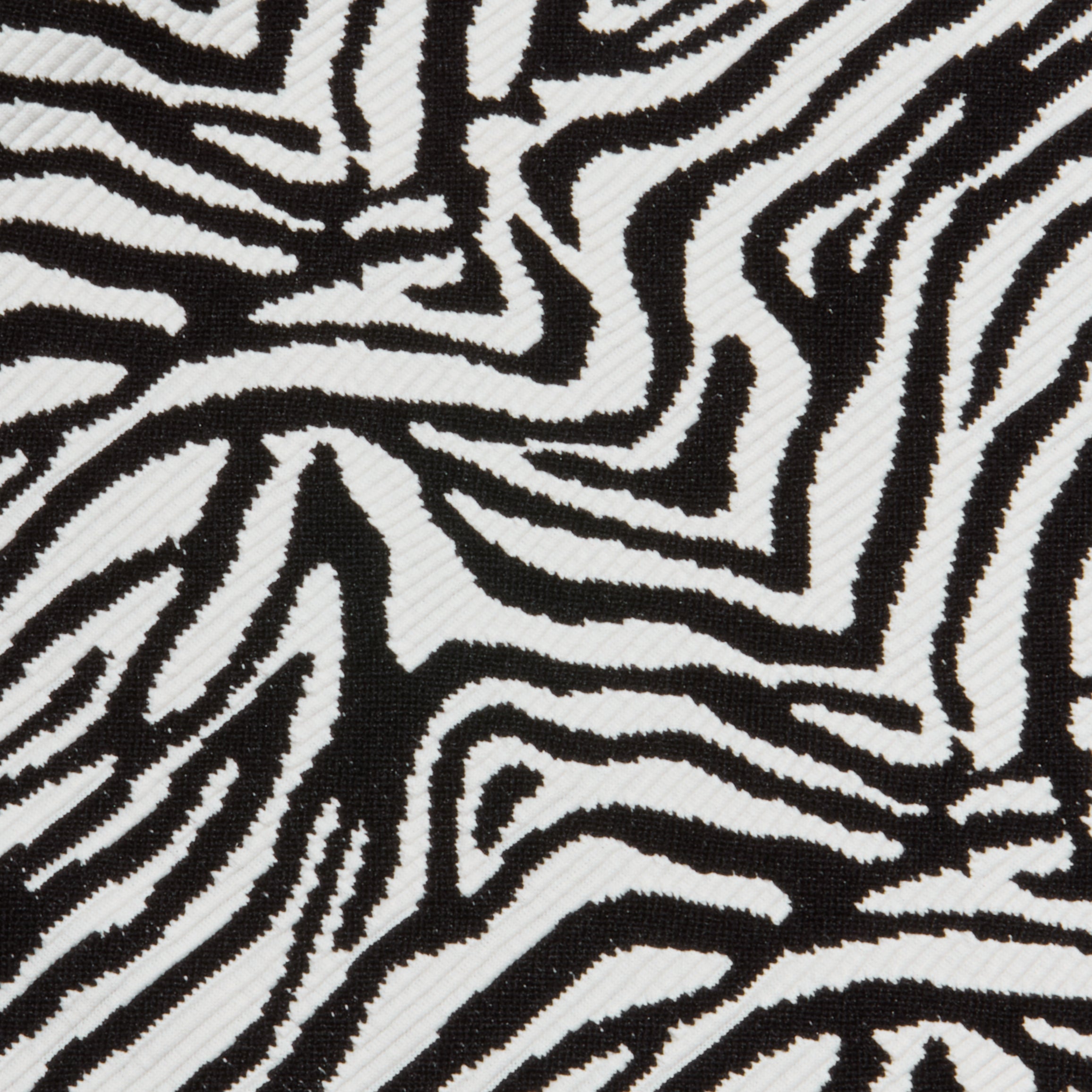 Close-up of the Lexie Bikini Top in a black and white zebra print with irregular, wavy stripes.