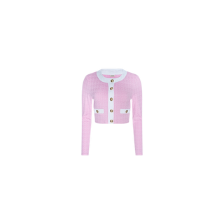 The Adaline Cardigan Cover-Up is a cropped pink cardigan featuring long sleeves, large gold buttons, white trim along the collar and front, and two front pockets accented with white trim. Crafted from textured bouclé fabric, it is displayed against a plain white background.