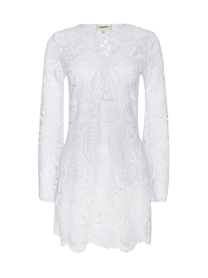 The Ansley Cover-Up Dress by L'AGENCE features long sleeves, white lace with a paisley pattern, a scalloped hem, and a keyhole neckline with a tie—making it the perfect boho choice for beach days or casual outings.