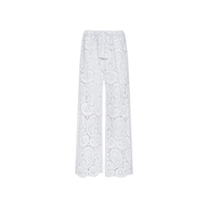 The Geraldine Cover-Up Pant features a white, wide-leg silhouette with an all-over paisley crochet lace pattern and a drawstring waist, displayed against a plain white background—an ideal choice for effortless resort wear.