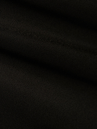 Close-up of black fabric with diagonal weave pattern and soft folds, highlighting the fine texture and subtle highlights on the surface, reminiscent of the refined Ashleigh Bikini Bottom.