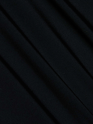 Close-up of the Lambert Paddlesuit by L'AGENCE shows black four-way stretch nylon with diagonal seams, fine weave, and subtle sheen—ideal texture for stylish, flexible swimwear.