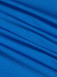 Close-up of the Britt Tie-Side Bikini Bottom in capri blue, showcasing its smooth, shiny fabric with diagonal soft folds. The light catches the ridges, creating a shimmering effect across the material.