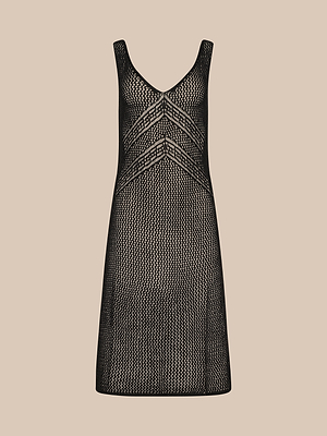 The Pallas Crochet Cover-Up Dress is a sleeveless black mesh piece with a V-neckline and geometric crochet details on the chest and waist, ideal for romantic beachwear or as a tropical cover-up, shown on a plain beige background.