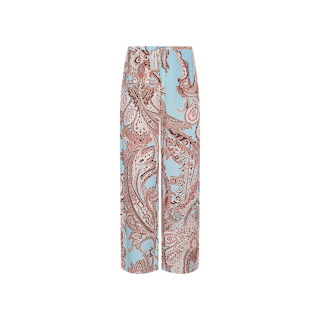 The Geraldine Cover-Up Pant features a relaxed wide-leg silhouette with a paisley print in shades of brown and cream on a light blue background, making it ideal for effortless resort wear and shown here against a white backdrop.