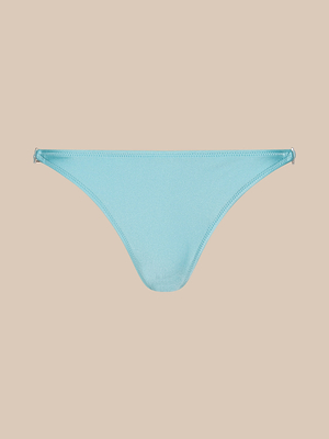Violet String Bikini Bottom featuring a simple, minimal design with thin sides and UPF 50 protection, shown on a plain beige background.