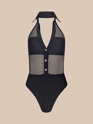 The Natalya Collared One-Piece Swimsuit features a black halter neck, mesh insets, a deep V-neckline with gold buttons, and a solid high-cut bottom, shown against a plain beige background.