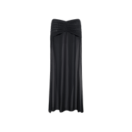 The Mahe Mesh Cover-Up Skirt is a black, semi-sheer maxi skirt featuring ruching at the top and a flowing, slightly flared mermaid silhouette—perfect for layering poolside or dressing up for an evening out.