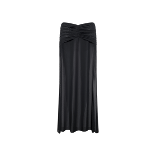The Mahe Mesh Cover-Up Skirt is a black, semi-sheer maxi skirt featuring ruching at the top and a flowing, slightly flared mermaid silhouette—perfect for layering poolside or dressing up for an evening out.