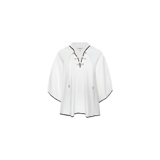 The Demeter Cover-Up Poncho is a white, poncho-style terrycloth garment with a lace-up front accented by gold details and finished with black trim along the edges, shown against a plain white background—an ideal fusion of comfort and spa-inspired style.
