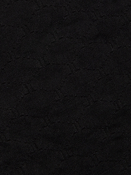 Close-up of the Annabelle Bikini Top crafted from dark black fabric with a subtle, woven geometric pattern and a slightly textured surface—perfect for UPF 50 swimwear or a chic black triangle bikini with an adjustable fit.