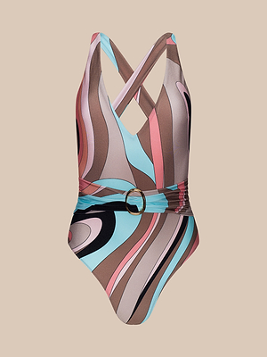 The Lisa Plunge One-Piece Swimsuit features a retro abstract swirl print in pink, brown, light blue, and beige on a pale beige background. It has a deep V-neck, crisscross back, and a belted waist with a round buckle.