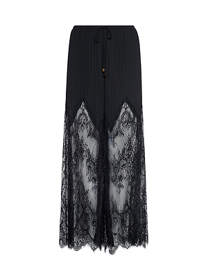 The Sharon Cover-Up Pant is a long black pant with a solid waistband and upper, featuring sheer lace from mid-thigh to hem, detailed with floral patterns and a scalloped edge.
