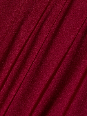 Close-up of the Annabelle Triangle Bikini Top’s deep red fabric with diagonal folds and a smooth, subtly shiny finish—perfect for adjustable ties. The lighting accentuates its soft drape and rich color.