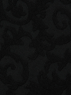 The Sally Bandeau Top by L’AGENCE features black jacquard terry fabric with a subtle, raised baroque-style floral and vine pattern for a textured, elegant look that channels retro glamour.