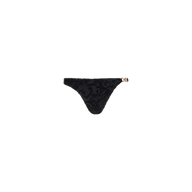 The Jean Bikini Bottom is a timeless black thong bikini bottom with a subtle floral pattern and decorative gold detail on the left hip, featuring a flattering high-leg cut, displayed on a plain white background.