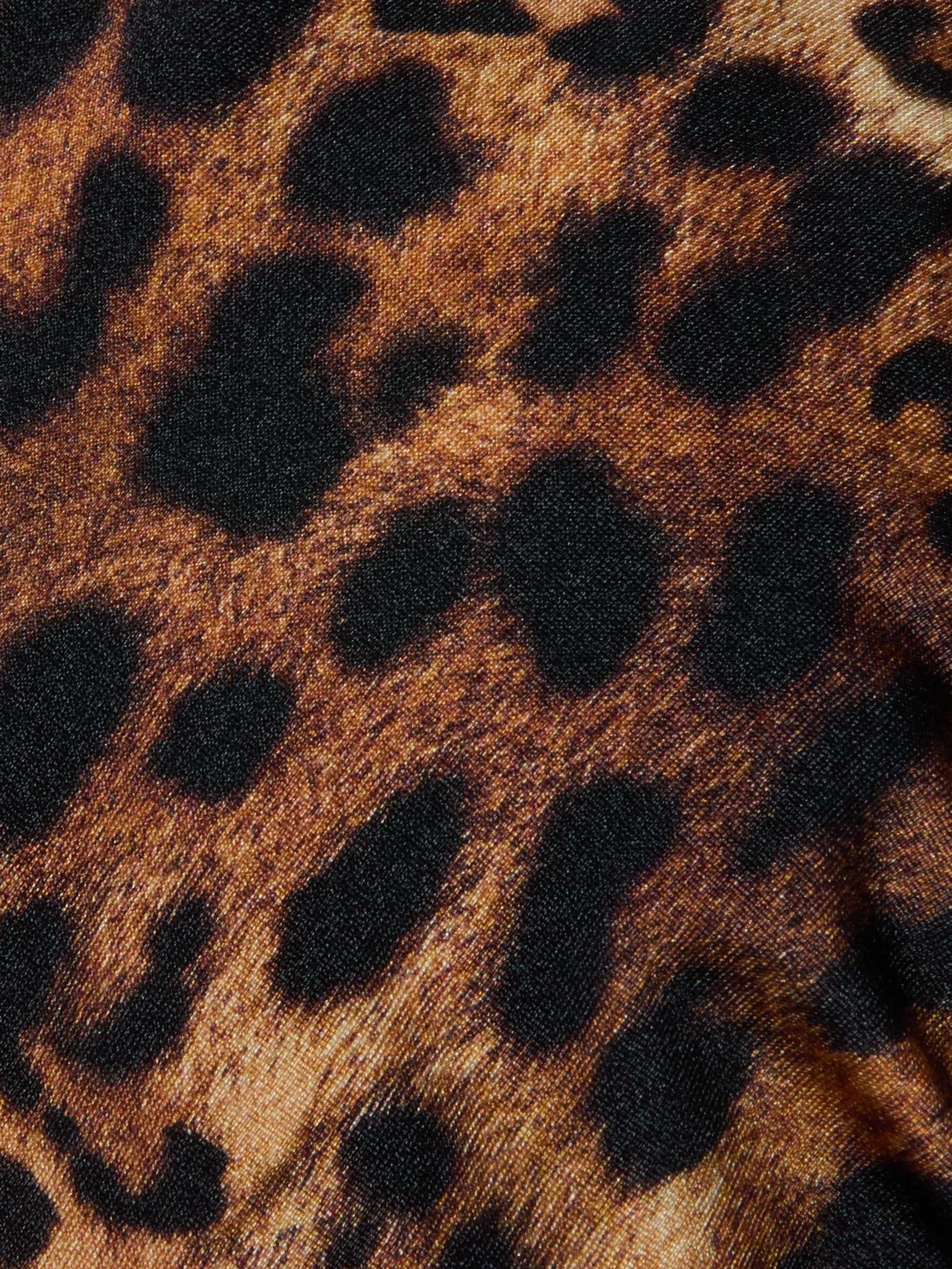 Close-up of the Annabelle Triangle Bikini Top fabric, showcasing its leopard print with black spots on a brown and tan background. The texture and weave of the material are clearly visible.
