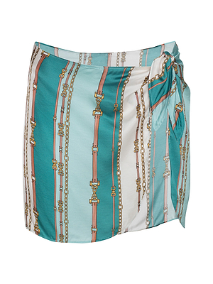 The Marceline Short Pareo is a lightweight viscose rayon wrap skirt with a side tie, featuring a teal, white, and light blue belt-stripe print with printed gold chains and buckles.