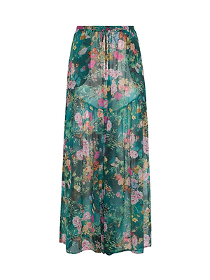 The Sharon Cover-Up Pant by L'AGENCE features a sheer, flowy teal-green fabric with a vibrant floral print and an elastic waistband with adjustable drawstring, offering stylish, comfortable beachwear.