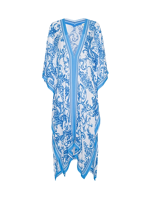 The Kara Kimono Cover-Up is a loose white kaftan in water-safe viscose crepe, showcasing blue baroque floral and scroll patterns with a V-neckline, draped sleeves, and an asymmetric hem, displayed on a plain white background.