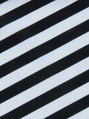 Diagonal black-and-white stripes create a bold, high-contrast look on the Kristin Triangle Bikini Top by L'AGENCE, perfect for a swim set with adjustable coverage.