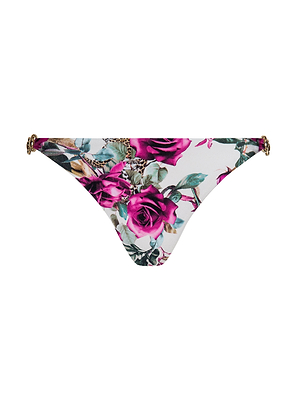 The Violet String Bikini Bottom features a vibrant rose leopard print with lush pink roses and green leaves on a plain white background, plus gold-tone ring details on both hips.