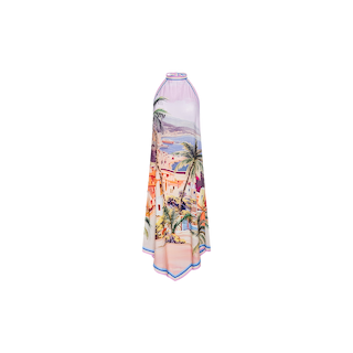 The Elise Cover-Up Dress is a sleeveless halter-neck midi dress made from water-safe crepe, showcasing a vibrant postcard print of a coastal village and palm trees, with a flowing asymmetrical hem, displayed on a plain white background.