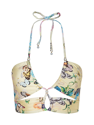 The Sirena Bikini Top features a halter design with a butterfly and floral print on pale yellow, front cutout detail, and elegant pearl accents along the straps.