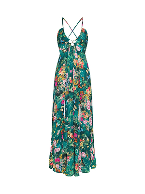 The Geneva Cover-Up Dress is a long, flowy maxi with spaghetti straps and a crisscross back, featuring a vibrant pink, yellow, and orange floral print—ideal for resort evenings.
