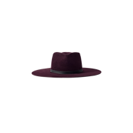 The Reyes Leather Band Fedora is a handcrafted, wide-brim hat in dark purple felt featuring a sleek black leather band around the base of the crown, shown against a plain white background.