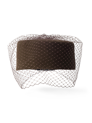 The Anstine Pillbox Hat exudes vintage sophistication with its dark brown hue and fine birdcage veil draping over the front and sides, shown against a white background.