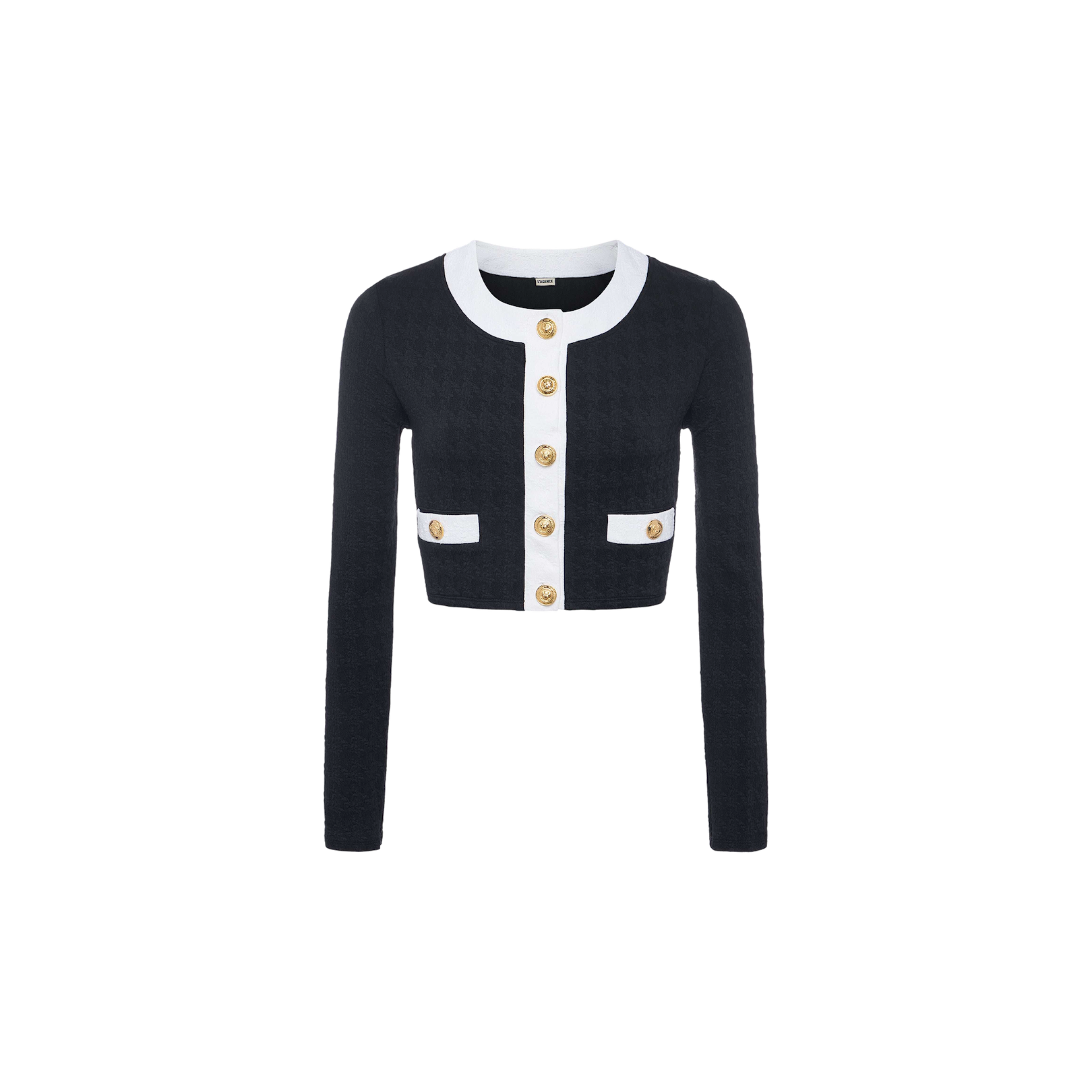 The Adaline Cardigan Cover-Up is a cropped black cardigan featuring white trim, gold buttons, long sleeves, and two front pockets. It is crafted from soft bouclé fabric and displayed on a plain white background.