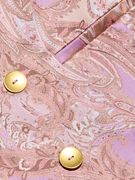 Close-up of the Colin Silk Blazer, featuring pink and beige paisley print silk charmeuse fabric with two shiny gold buttons and a fabric fold near the top right corner.