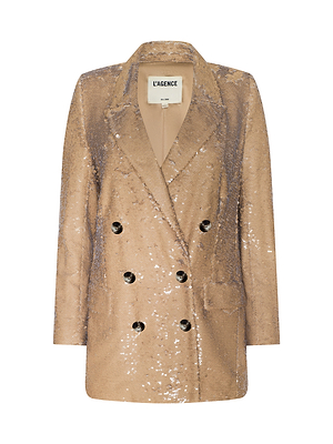 The Cambrie Oversized Sequin Blazer features a tan finish with black buttons, notch lapels, and all-over sequins. Lined at the collar with the “L’AGENCE” label, it’s an eye-catching statement piece for Spring 2026.