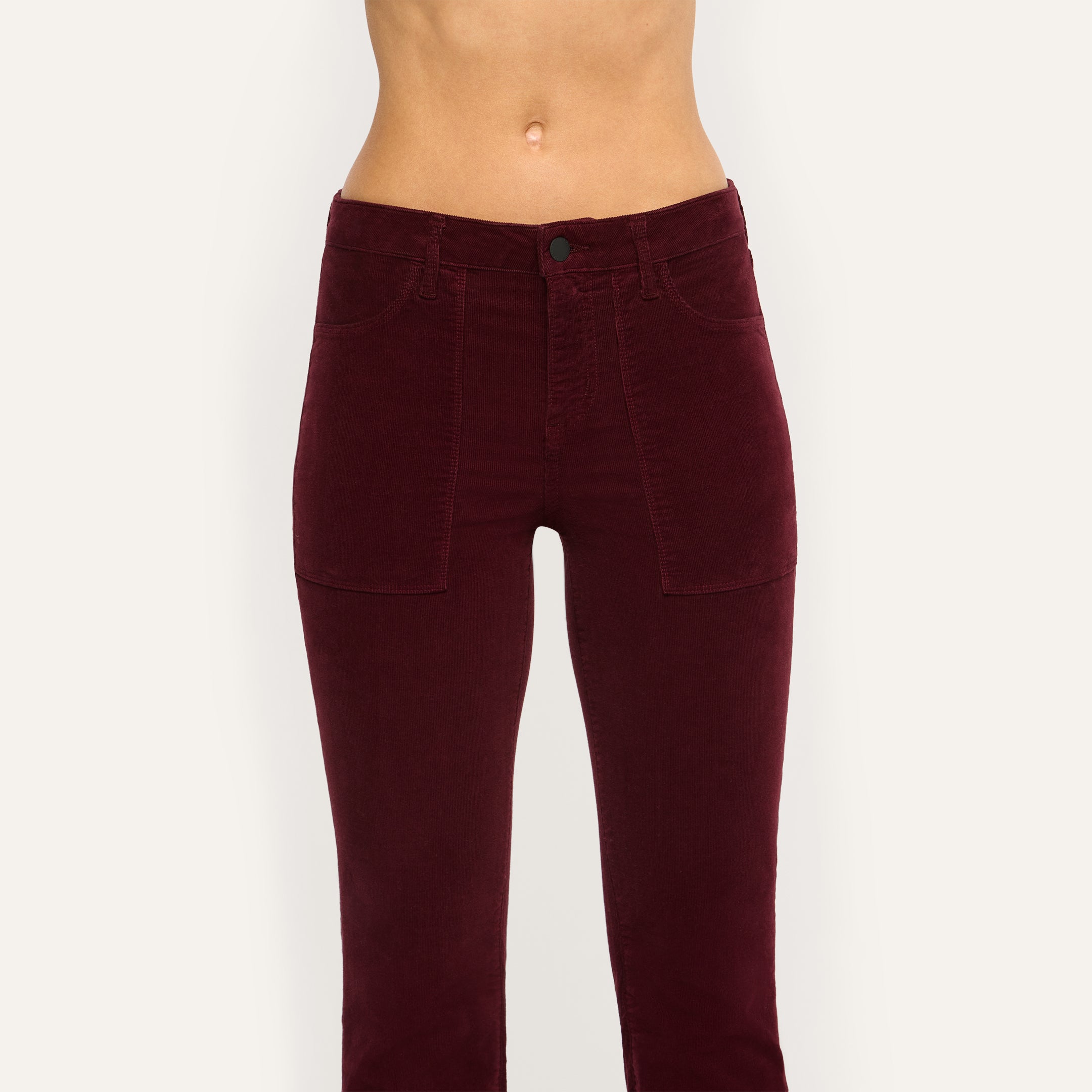 Saffia Corduroy Pant: High-rise burgundy stretch corduroy pants in a slim-straight fit with front patch pockets.