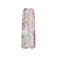 The Lillian Satin Wide-Leg Pant features an ultra-wide silhouette with a pastel floral and pink palm leaf print, finished with an elastic waistband. Crafted from lightweight, flowy jacquard satin, the fabric stands out against a crisp white background.