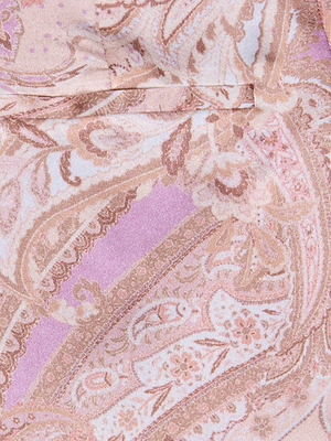 Close-up of paisley print fabric in pink, lavender, and beige with swirls and floral motifs—ideal for the Pilar Silk Wide-Leg Pant, lending these high-rise pants a soft, elegant look.