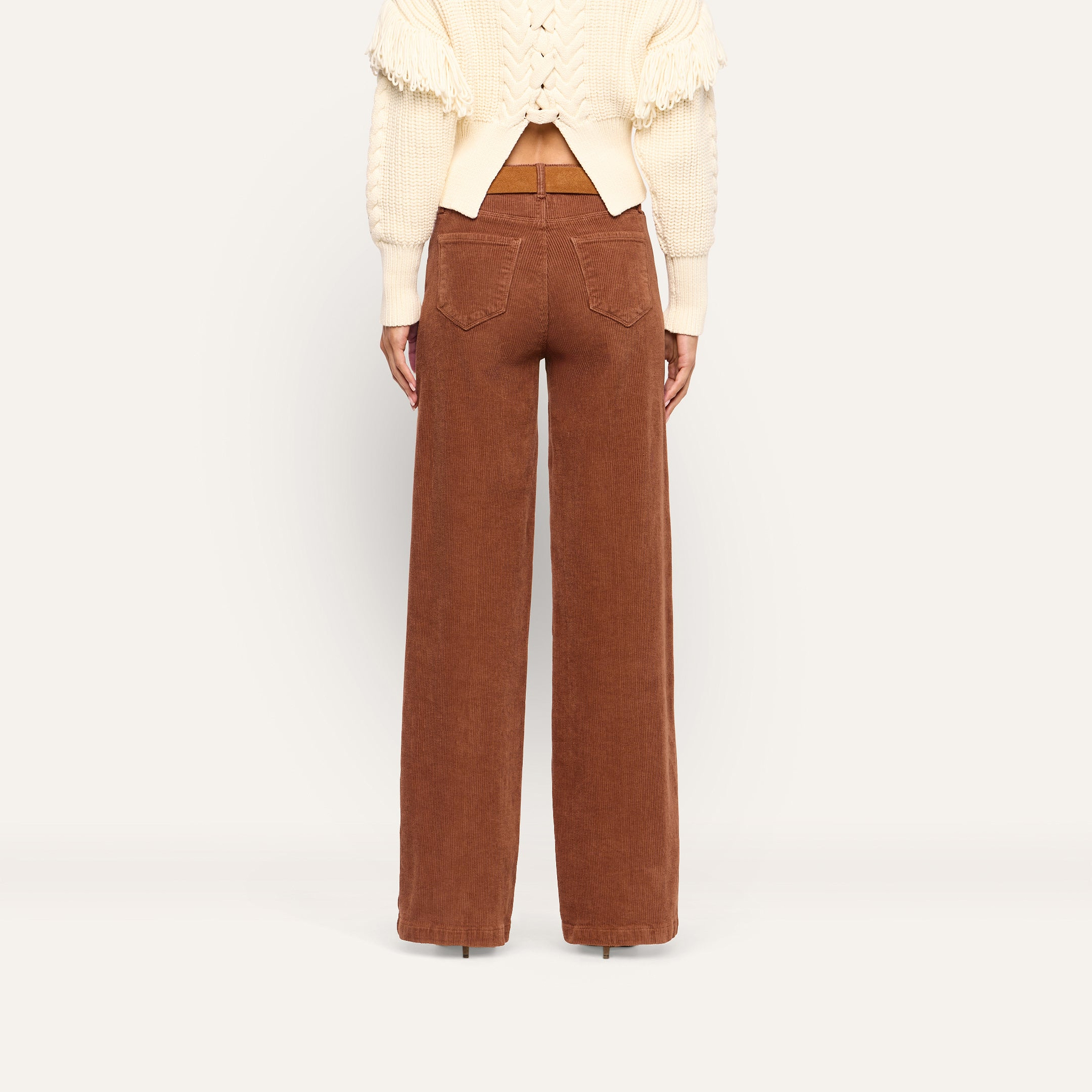 Back view of Scottie Corduroy Wide-Leg Pant in cognac brown featuring a high-rise fit, wide legs, and a brown belt.