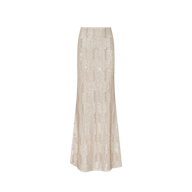 The Zeta Sequin Maxi Skirt is a long, high-waisted cream maxi skirt embellished with champagne sequins for a touch of shimmer. Fitted at the waist and hips before gently flaring out at the hem, this elegant piece is ideal for special occasions and is shown against a plain white background.