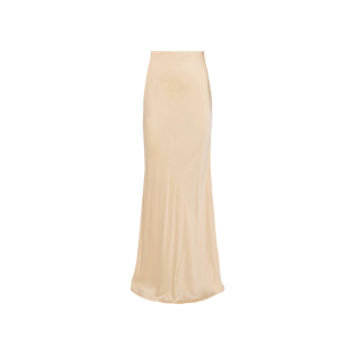 The Zeta Satin Maxi Skirt is a long, high-waisted piece in a champagne hue with a smooth, shiny finish and a slight flare at the hem, creating an elegant maxi silhouette against a plain white background.