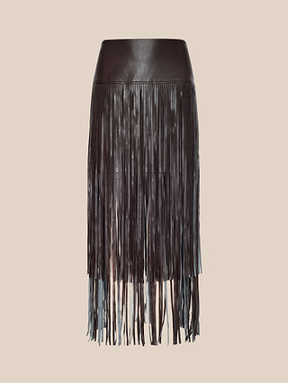 The Karolina Fringe Skirt is crafted from black vegan leather and features cascading long, thin fringe strands that add layered texture and movement. Displayed against a plain beige background, this statement piece is the perfect addition to any modern wardrobe.