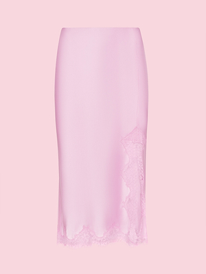 The Tico Silk Lace Skirt from our Legally Blonde collection features pastel pink satin with delicate lace trim at the hem and side, shown on a plain light pink background.