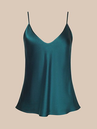 Lexi Silk Camisole in teal satin, featuring adjustable straps and a V-neckline, crafted from bias-cut silk for an elegant drape, displayed against a solid beige background.