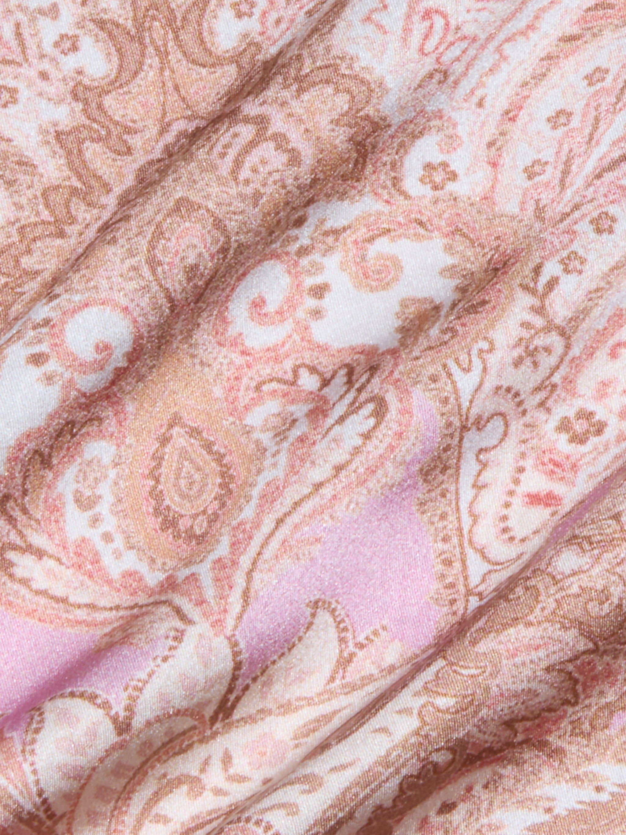 Close-up of the Lexi Silk Camisole in pink, beige, and cream paisley-patterned bias-cut silk fabric, featuring soft folds and a subtle sheen.