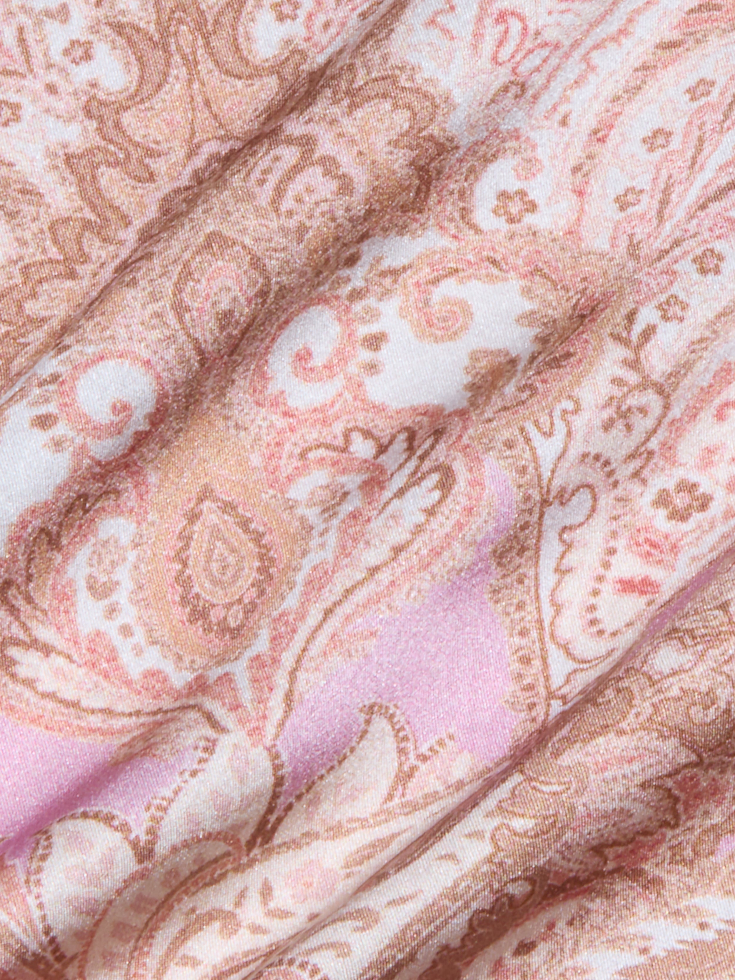 Close-up of the Lexi Silk Camisole in pink, beige, and cream paisley-patterned bias-cut silk fabric, featuring soft folds and a subtle sheen.