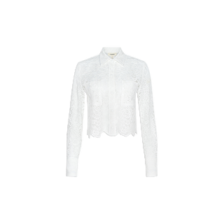 The Roelle Lace Blouse is a white, long-sleeve, button-up sheer blouse featuring delicate floral lace detailing, a pointed collar, two chest patch pockets, and a slightly cropped hem, displayed against a plain white background.
