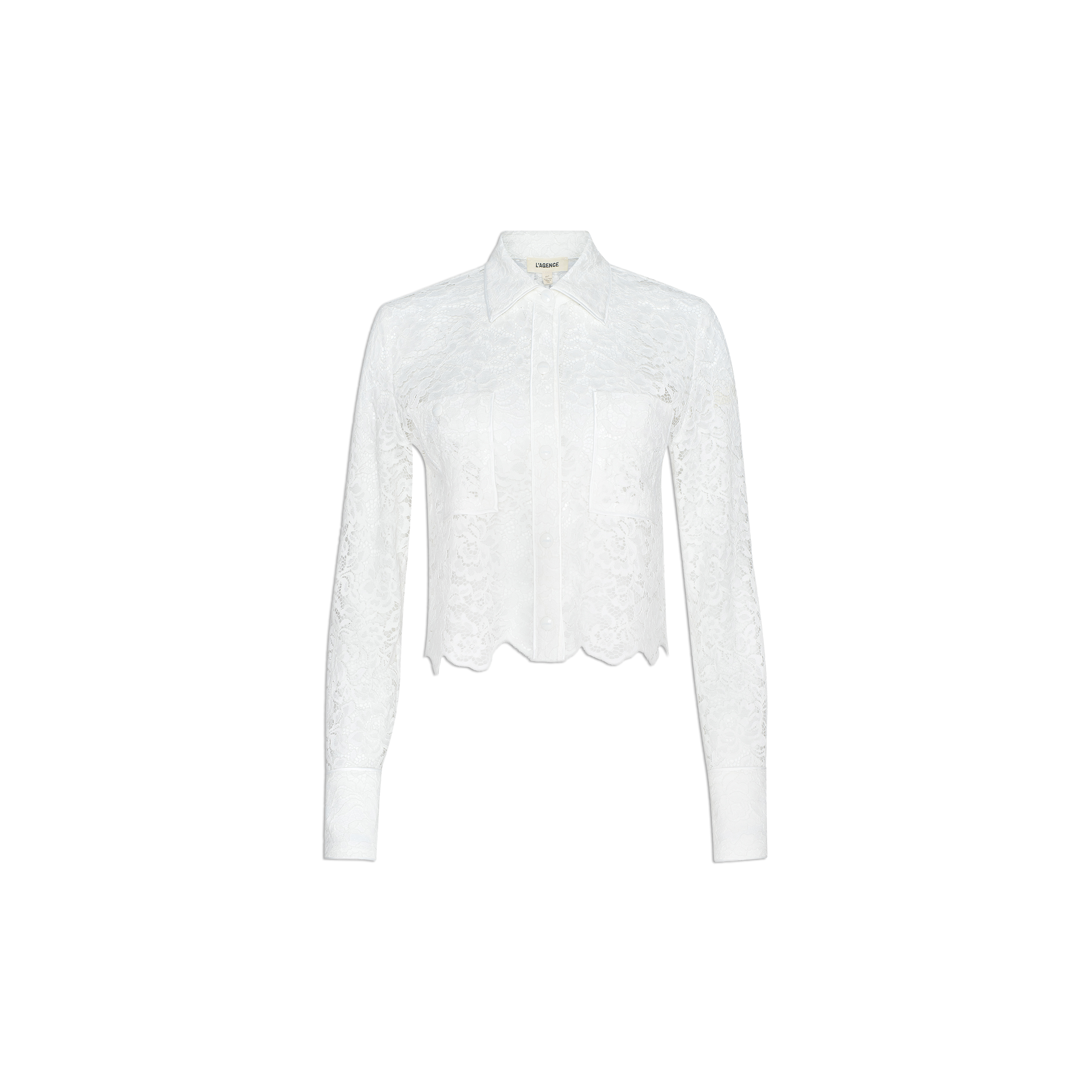 The Roelle Lace Blouse, a romantic long-sleeved white floral lace top featuring a collared neckline, button-down front, and two chest pockets, is displayed on a plain white background.