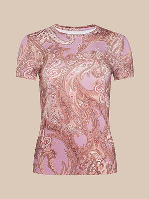 The Ressi Fitted Tee is a bestselling women’s short-sleeve top with a slim fit, showcasing a pink and beige paisley design on stretch jersey, displayed against a solid beige background.