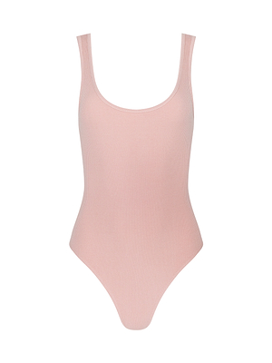 The Nica Scoopneck Bodysuit is a light pink, sleeveless stretch rib piece with high-cut legs and a scoop neckline, shown on a white background.