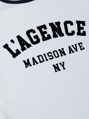The Tommie Crewneck Tee is crafted from soft Supima cotton in white and features black collegiate-style LAGENCE MADISON AVE NY text in a relaxed fit.